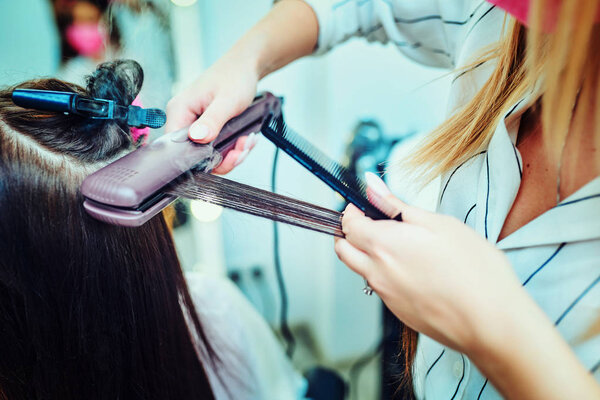 Beautiful woman getting prepared for the wedding