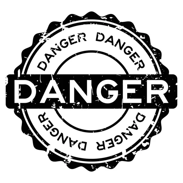 Grunge siyah tehlike kelime yuvarlak lastik mühür damgası beyaz arka plan üzerinde