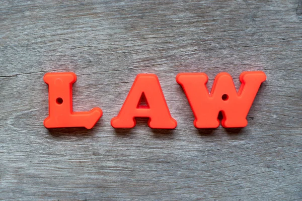 Красочный Пластиковый Алфавит Слове Закон Деревянном Фоне — стоковое фото