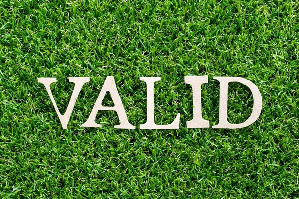 Wood Letter Word Valid Artificial Green Grass Background — Stock Photo, Image