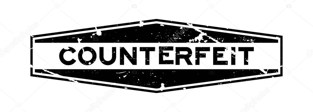 Grunge black counterfeit word hexagon rubber seal stamp on white background