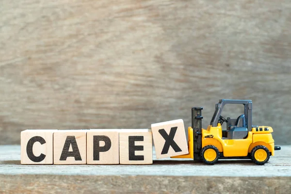 Toy Forklift Hold Letter Block Complete Word Capex Abbreviation Capital — Stock Photo, Image