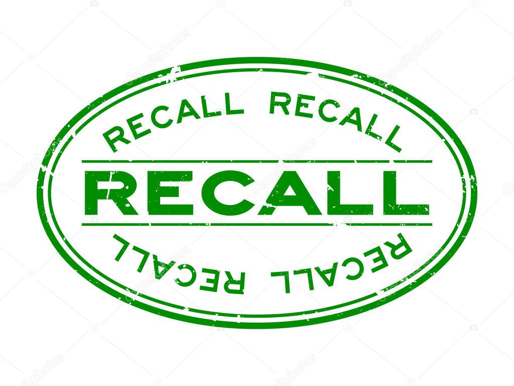Grunge green recall word oval rubber seal stamp on white background