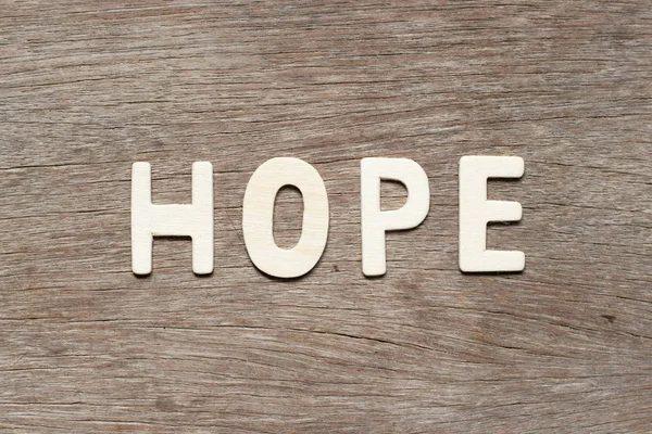Alphabet Buchstabe in Wort Hoffnung auf Holz Hintergrund — Stockfoto