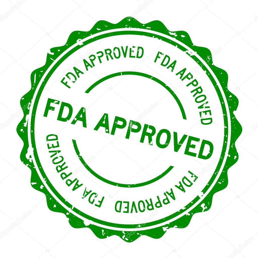 Grunge green FDA approved word round rubber seal stamp on white background