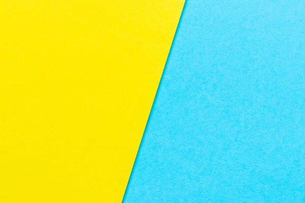 Fondo texturizado de papel de color amarillo y azul claro abstracto con espacio de copia para diseño y decoración — Foto de Stock