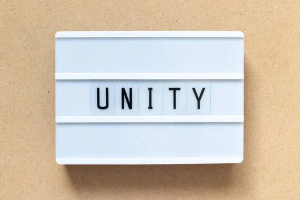 Λευκό lightbox με τη λέξη ενότητα στο φόντο ξύλο — Φωτογραφία Αρχείου