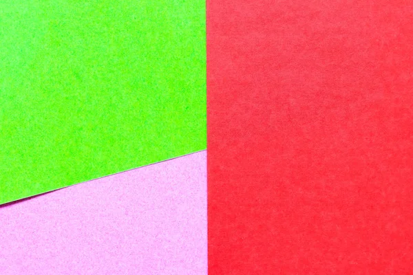 Papír s abstraktním zeleným, růžovým a červeným barevným papírem s texturovými mezerami pro návrh a dekoraci — Stock fotografie
