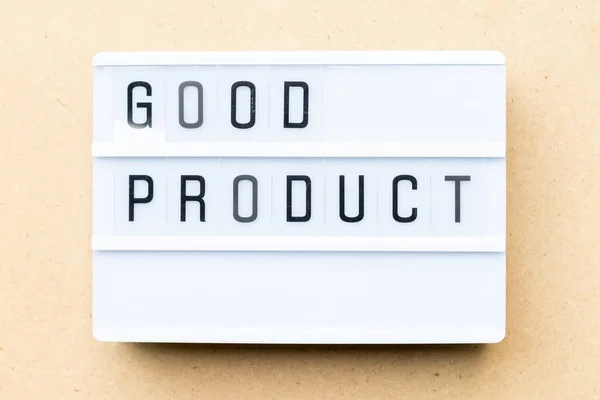 Λευκό lightbox με λέξη καλό προϊόν σε ξύλο φόντο — Φωτογραφία Αρχείου