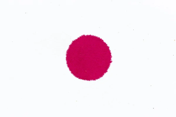 Red ink dot splashed on white paper background — Stock Photo, Image