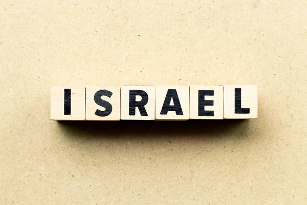 Bloque de letras en palabra israel sobre fondo de madera — Foto de Stock