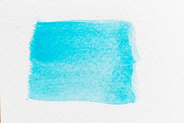 Desenho de aquarela de cor azul como escova de linha no fundo do papel branco — Fotografia de Stock