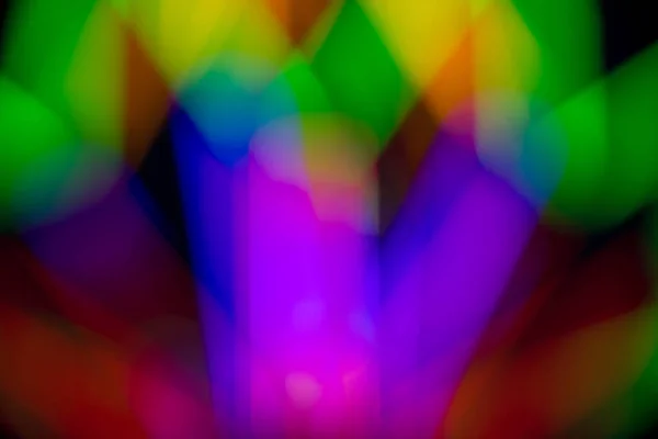 Abstrato multi cor de brilho fluorescente sobre fundo preto — Fotografia de Stock