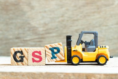 Oyun forklift harf blok P tamamlamak için GSP (İyi Depolama Uygulamasının kısaltması veya Genel Tercihler Sistemi veya Ahşap arka plan üzerinde GSP)
