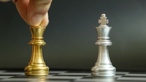 Gold King Chess Piece Knock Win Silver Team Black Background — Αρχείο Βίντεο