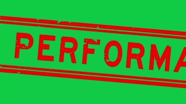 Grunge kırmızı yüksek performanslı kelime kare kauçuk mühür yeşil arka planda yakınlaştır