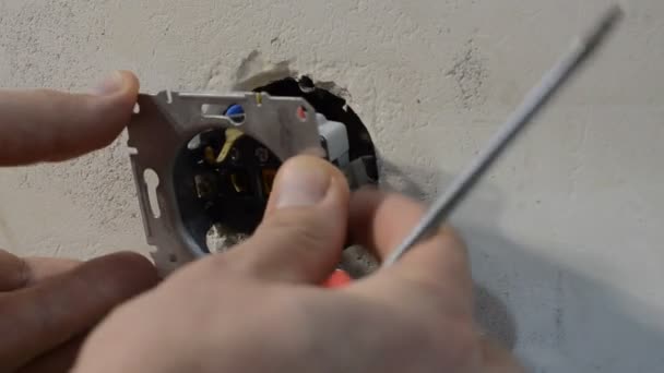 Master Repairs Socket Screwdriver Installing Wall — Stock Video