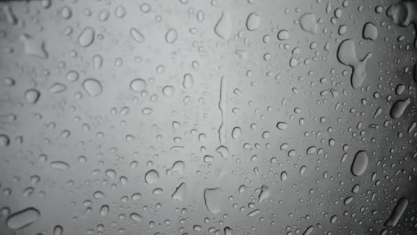 Gotas Lluvia Fluyen Por Vidrio — Vídeo de stock