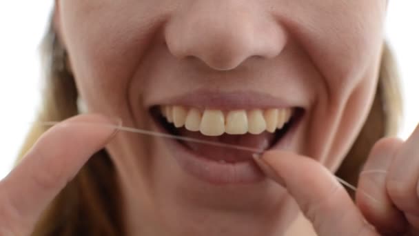 Young Girl Flossing Her Teeth — Stock Video