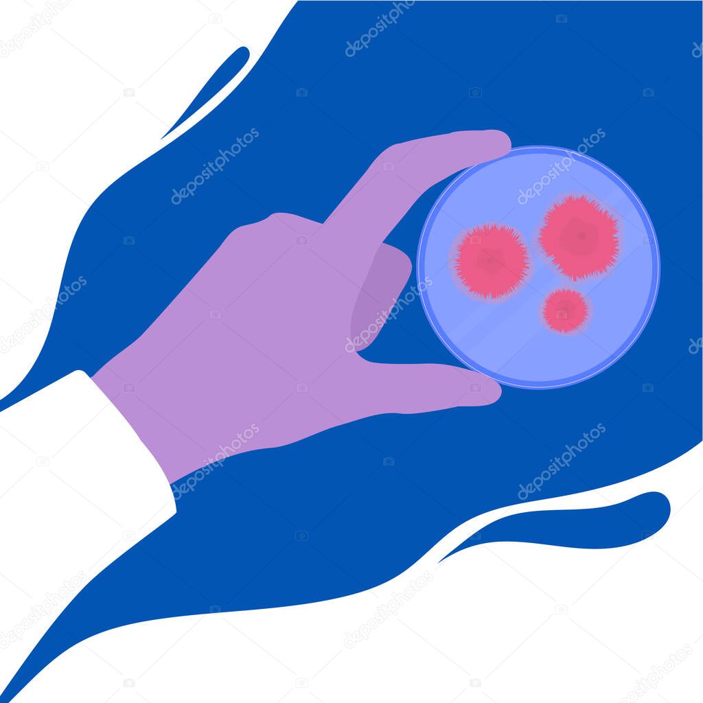 Petri dish with mold culture in the hand of a scientist