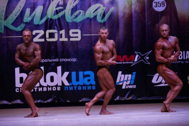 7 Nisan 2019 'da Kiev Politeknik Enstitüsü' ndeki Kiev City vücut geliştirme kupasındaki erkekler performansı