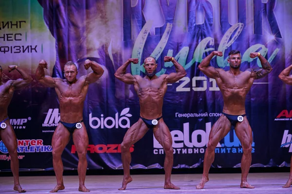 Mænds Ydeevne Kiev City Bodybuilding Cup Lokaler Kiev Polytechnic Institute - Stock-foto