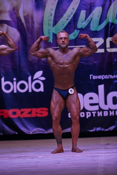 Mænds Ydeevne Kiev City Bodybuilding Cup Lokaler Kiev Polytechnic Institute - Stock-foto