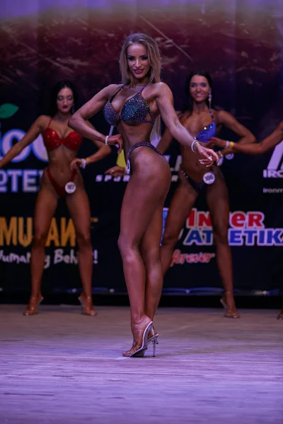 https://st4.depositphotos.com/7824466/40849/i/450/depositphotos_408498570-stock-photo-girls-performance-kiev-city-bodybuilding.jpg