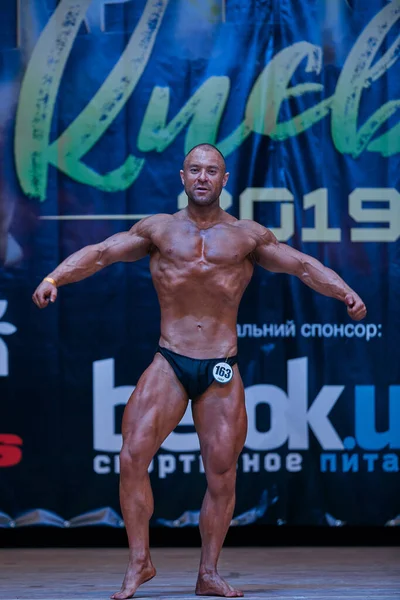 Mænds Ydeevne Kiev City Bodybuilding Cup Lokaler Kiev Polytechnic Institute - Stock-foto