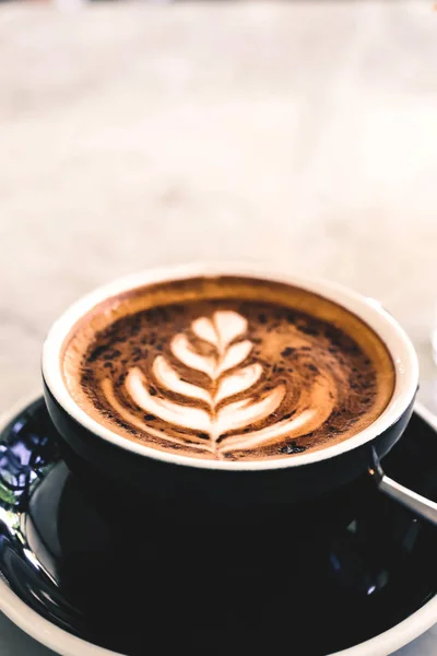 Cup Hot Cappucino Marble Table Background Black Cup Some Flowers — Stock Photo, Image