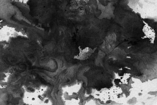 Abstract black ink stain. Chinese ink background on watercolor paper.