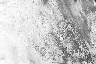 Soyut mürekkep arkaplanı. Mermer tarzı. Beyaz kağıda siyah boya dokusu. Ağ ve oyun tasarımı için duvar kağıdı. Grunge çamur sanatı. Kalem suyunun makro resmi. Koyu Smear