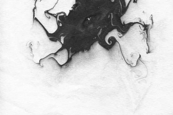 Abstract black ink stain. Chinese ink background on watercolor paper.