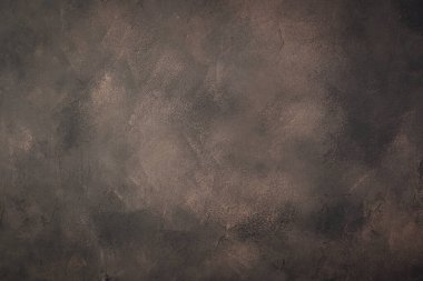 Yatay kahverengi çimento arka plan ve koyu çizikler.