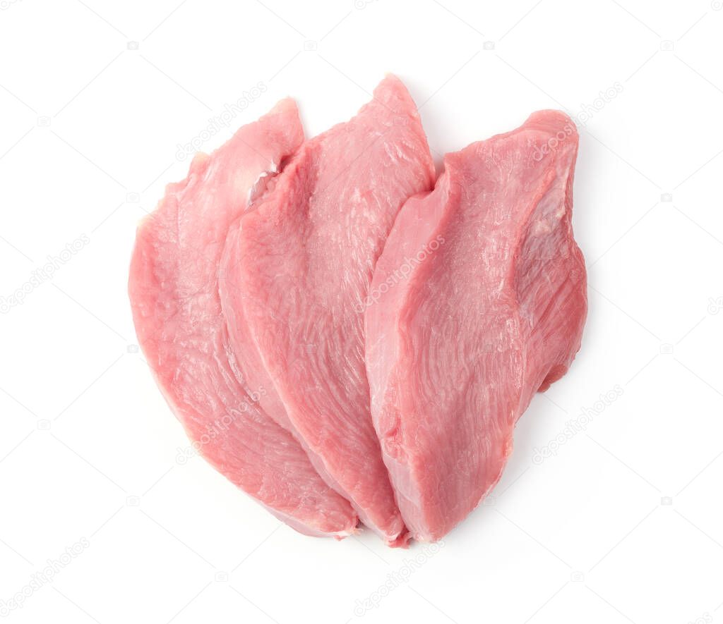 Diet Turkey meat is cut into steaks, isolated on a white background.