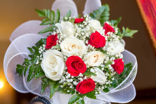 beautiful bridal bouquet with red and white roses. High quality photobeautiful bridal bouquet with red and white roses