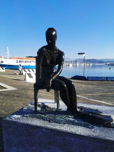 La Spezia , Italy 02 11 2019 : little mermaid statue on the pier in sunny day
