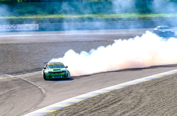 Close-up of a Race Car Drifting at a Race Track · Free Stock Photo