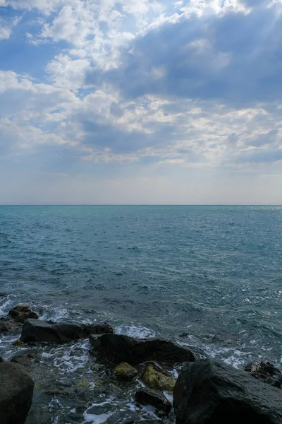 beach focene ostia Roman coast with sand and rocks. High quality photo