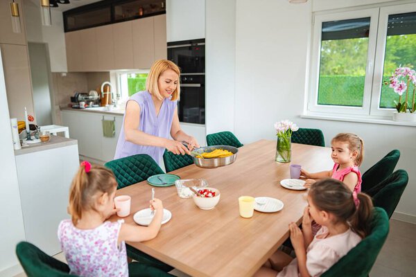 A joyful moment of togetherness over delicious food.