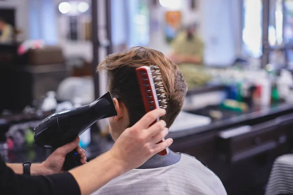 Man haircut in barbershop