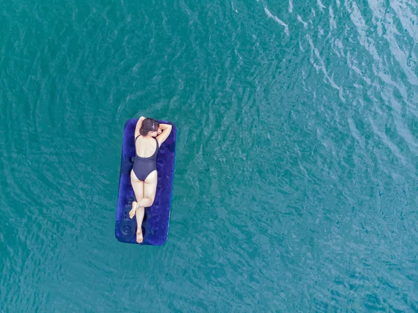 Woman Mattress Azure Water Overhead View Copy Space Summer Time — Stock Photo, Image