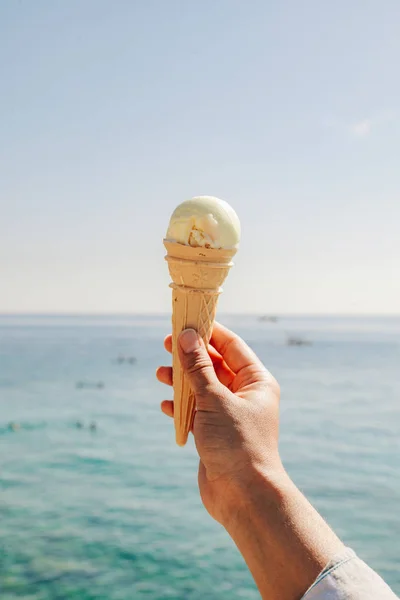 Woman Hand Hold Ice Cream Sea Background — Stock Photo, Image