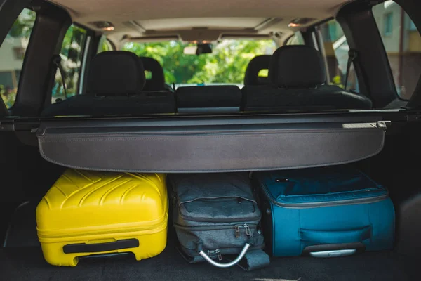 car trunk with loaded bags. car travel concept. road trip