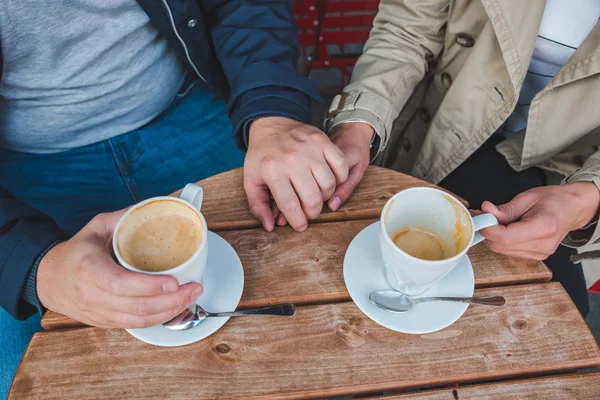Couple Holding Hands While Drinking Latte Outdoors Cafe Close — Stock Photo, Image