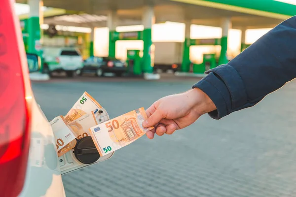 Man Hand Put Money Euro Car Tank Gas Station Concept — Stock Photo, Image