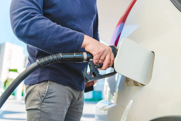 refueling car at gas station. ready for long road trip