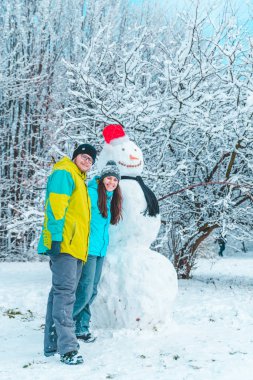 Kaç Dondurulmuş kış gün kavramında kardan adam yapma