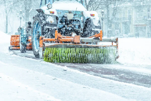 snowplow close up cleaning street of snow concept