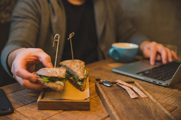 Man Taking Sandwich Cafe Working Laptop Close Faces Concept — Stock Photo, Image